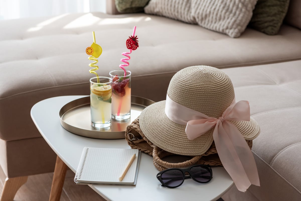 Two refreshing fruit cocktails on a minimalist coffee table
